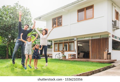 Portrait Asian Family Front Of House, Happy Family Home Concept