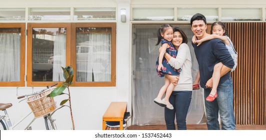 Portrait Asian Family Front Of House, Happy Family Home Concept