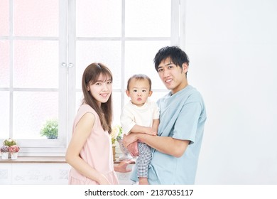 Portrait Of Asian Family At Home