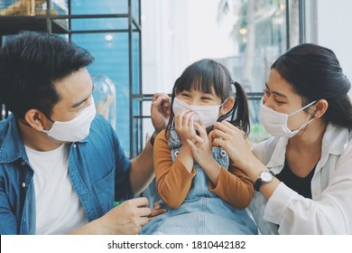 Portrait Of Asian Family With Surgical Mask.