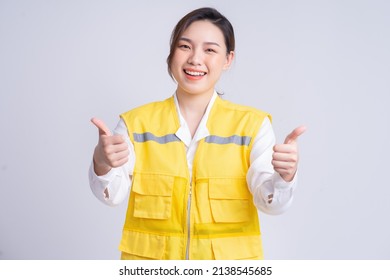 Portrait Of Asian Female Construction Engineer On White Background
