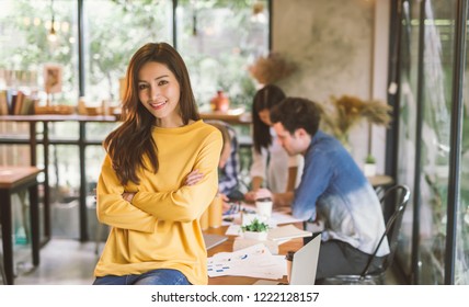 Portrait Of Asian Female Creativity Working Team Coworking Office ,Smiling Of Happy Beautiful Woman In Modern Office