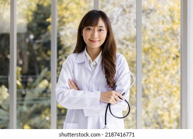 Portrait Asian Female Doctor Arms Crossed With Stethoscope Healthcare Professionals