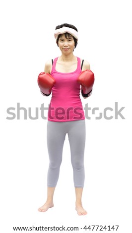 Portrait of Asian female in a fighting pose.