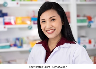 Portrait Of Asian Female Pharmacist In Drugstore Thailand 