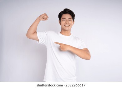 Portrait of an Asian guy posing on a white background - Powered by Shutterstock