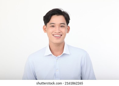 Portrait Of An Asian Handsome Young And Cheerful Man, Isolated On White Background