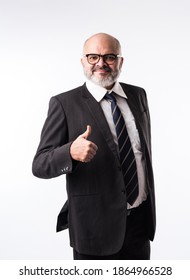 Portrait of an Asian Indian senior business man enjoying or celebrating success, screaming or with thumbs up symbol against white - Isolated