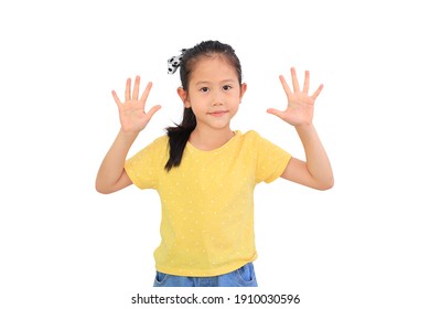 Portrait of asian little child girl showing ten finger isolated on white background.