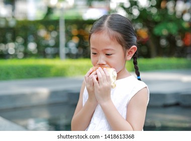 Portrait Asian Little Girl Eating Bread Stock Photo 1418613368 ...