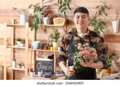 Portrait Of Asian Male Florist In Shop