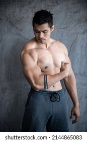 Portrait Of Asian Man Big Muscle At The Gym,Thailand People,Workout For Good Healthy,Body Weight Training,Fitness At The Gym Concept