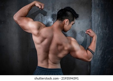 Portrait Of Asian Man Big Muscle At The Gym,Thailand People,Workout For Good Healthy,Body Weight Training,Fitness At The Gym Concept