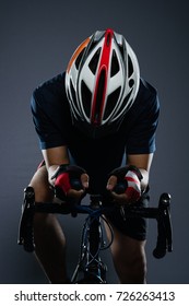 Portrait Of An Asian Man Cyclist With Helmet And His Bike.