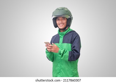 Portrait Of Asian Online Taxi Driver Wearing Green Jacket And Helmet . Isolated Image On White Background