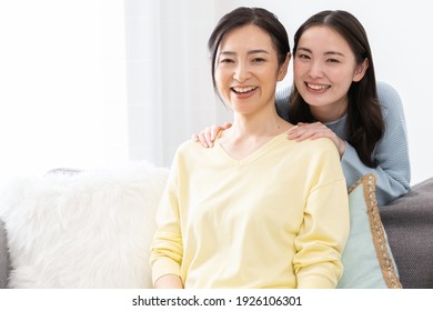 Portrait of Asian parent and child