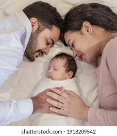 Portrait Of Asian Parents Newborn Baby, Closeup Portrait Of Asian Young Couple Father Mother Day Holding New Born Baby In Hospital Bed. Happy Asia Lovely Family, Nursery Breastfeeding Mother’s Day