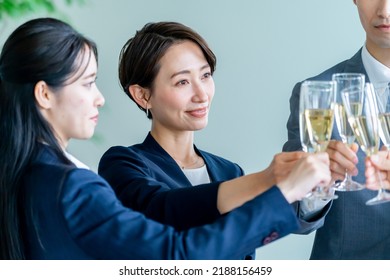 Portrait Of Asian People Toasting