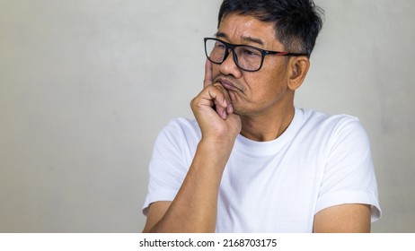 Portrait Asian Senior Man, Face Thinking About Something Isolated On White Background - Lifestyle Senior Male Thinking About The Question