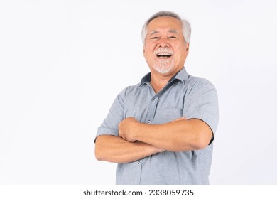 Portrait Asian senior man , old man , standing arms crossed feel happy good health , laughing isolated on white background with copy space - lifestyle senior male concept - Powered by Shutterstock