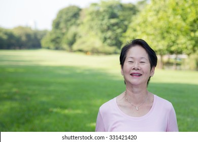 Portrait Of Asian Senior Woman In The Park