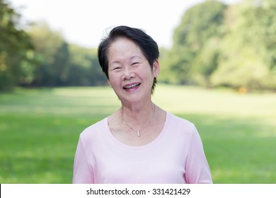 Portrait Of Asian Senior Woman In The Park