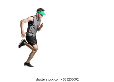 Portrait of an asian sport man wearing sportwear and green visor for running. Isolated full length on white background with copy space