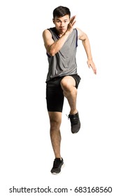 Portrait of an asian sport man wearing sportwear and running. Isolated full length on white background with copy space - Shutterstock ID 683168560