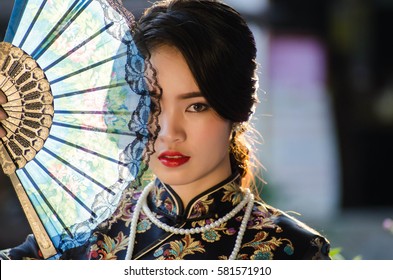 Portrait Of Asian At Traditional Chinese Dress.