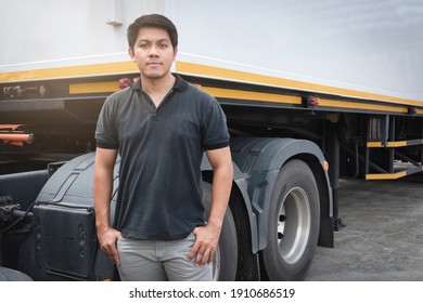 Portrait Of Asian A Truck Driver Standing With Trailer Truck. People Worker. Lorry Truck. Fright Transportation