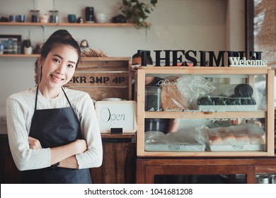 Portrait Asian Woman Business Owner With Bakery Shop Background