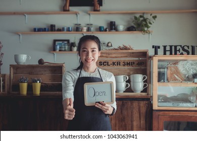 Portrait Asian Woman Business Owner With Bakery Shop Background