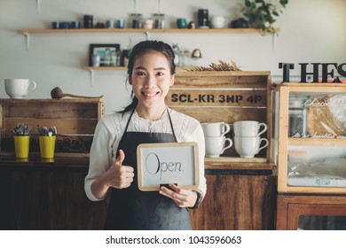 Portrait Asian Woman Business Owner With Bakery Shop Background