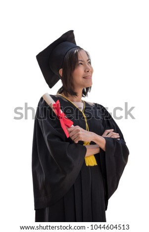 Portrait of Asian woman with graduation cap and gown holding diploma isolated on white background.