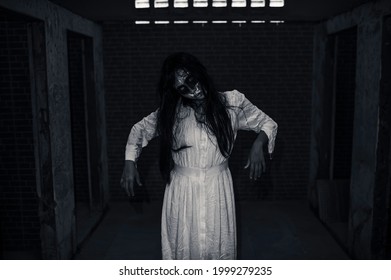 Portrait of asian woman make up ghost face,Horror scene,Scary background,Halloween poster,Stack three ghost photo