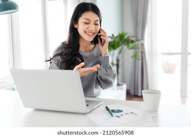 Portrait Of Asian Woman Working From Home