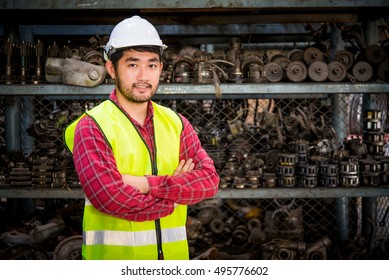  Portrait Of Asian Worker In Factory Warehouse Car Parts.