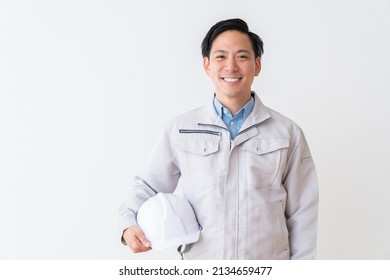 Portrait Of Asian Young Construction Worker