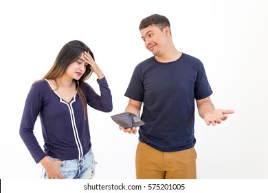portrait asian young couple showing holding empty wallet, no money ,looking surprised, on white background. Negative facial expression emotion feeling