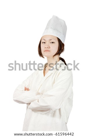 Portrait of asian young female cook  over  white