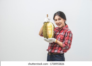 Portrait Asian Young Woman She Smiling And Holding Durian Fruit. Female Farmer Happy Holding Durian Fruit In Studio White Background.