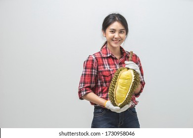 Portrait Asian Young Woman She Smiling And Holding Show Durian Fruit. Female Farmer Happy Holding Durian Fruit In Studio White Background.