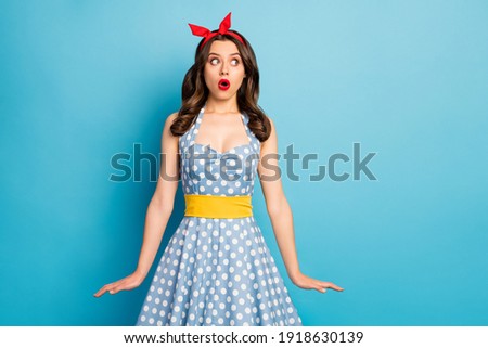 Portrait of astonished frustrated girl look copyspace impressed feel fear anxious nervous scream wow omg wear skirt isolated over blue color background