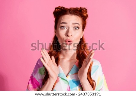 Portrait of astonished funny woman with foxy hairstyle wear print shirt staring at impressive sale isolated on pink color background