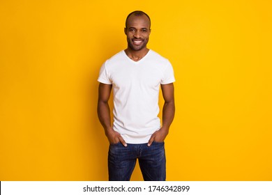 Portrait Of Attractive Afro American Guy Enjoy Spring Free Time Weekend Put Hands Pocket Wear Modern Hipster Clothes Isolated Over Vivid Color Background