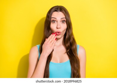 Portrait of attractive amazed cheerful girl sudden news pout lips isolated over bright yellow color background