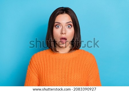 Portrait of attractive amazed girl sudden incredible news reaction wow isolated over bright blue color background 商業照片 © 