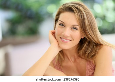 Portrait Of Attractive Blond Woman At Home