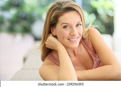 Portrait Of Attractive Blond Woman At Home