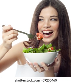 Portrait Of Attractive  Caucasian Smiling Woman Isolated On White Studio Shot Eating Salat